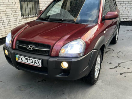 Красный Хендай Туксон, объемом двигателя 1.98 л и пробегом 160 тыс. км за 7900 $, фото 1 на Automoto.ua