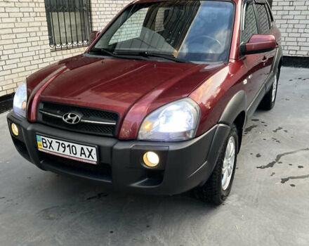 Красный Хендай Туксон, объемом двигателя 1.98 л и пробегом 160 тыс. км за 7900 $, фото 1 на Automoto.ua