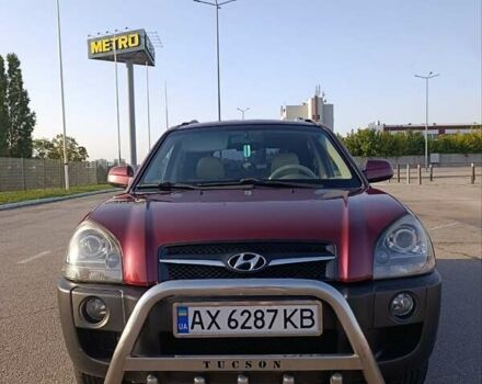 Червоний Хендай Туксон, об'ємом двигуна 1.98 л та пробігом 251 тис. км за 8500 $, фото 1 на Automoto.ua
