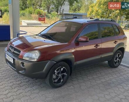 Червоний Хендай Туксон, об'ємом двигуна 1.99 л та пробігом 246 тис. км за 8200 $, фото 1 на Automoto.ua