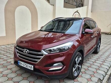 Красный Хендай Туксон, объемом двигателя 2 л и пробегом 97 тыс. км за 20500 $, фото 1 на Automoto.ua