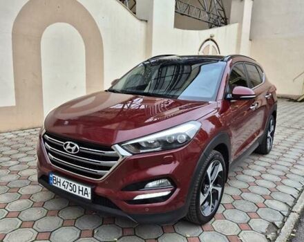 Красный Хендай Туксон, объемом двигателя 2 л и пробегом 97 тыс. км за 20500 $, фото 1 на Automoto.ua