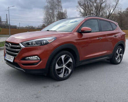 Красный Хендай Туксон, объемом двигателя 1.59 л и пробегом 123 тыс. км за 14600 $, фото 1 на Automoto.ua