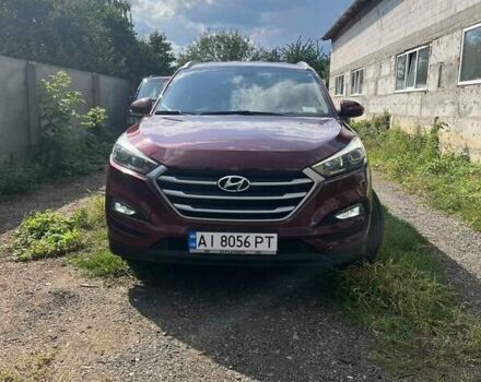 Красный Хендай Туксон, объемом двигателя 2 л и пробегом 101 тыс. км за 15700 $, фото 1 на Automoto.ua