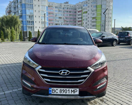 Красный Хендай Туксон, объемом двигателя 2 л и пробегом 133 тыс. км за 14500 $, фото 1 на Automoto.ua