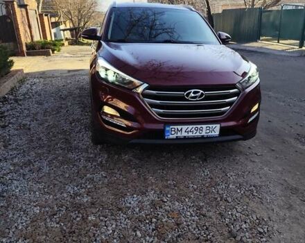 Красный Хендай Туксон, объемом двигателя 1.98 л и пробегом 110 тыс. км за 18999 $, фото 1 на Automoto.ua