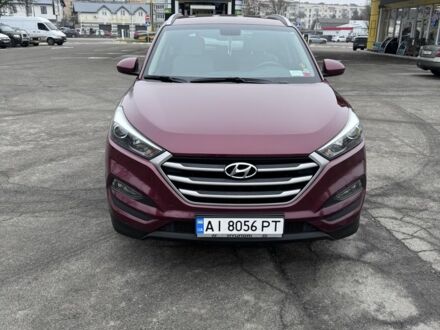 Красный Хендай Туксон, объемом двигателя 2 л и пробегом 101 тыс. км за 14800 $, фото 1 на Automoto.ua