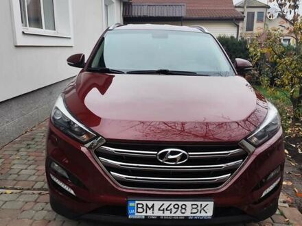 Красный Хендай Туксон, объемом двигателя 2.02 л и пробегом 110 тыс. км за 19800 $, фото 1 на Automoto.ua