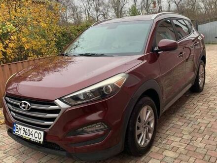 Красный Хендай Туксон, объемом двигателя 2 л и пробегом 123 тыс. км за 15300 $, фото 1 на Automoto.ua