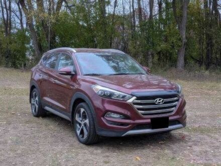 Красный Хендай Туксон, объемом двигателя 1.6 л и пробегом 89 тыс. км за 11000 $, фото 1 на Automoto.ua