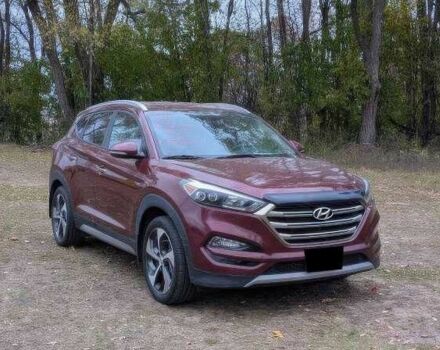 Красный Хендай Туксон, объемом двигателя 1.6 л и пробегом 89 тыс. км за 11000 $, фото 1 на Automoto.ua