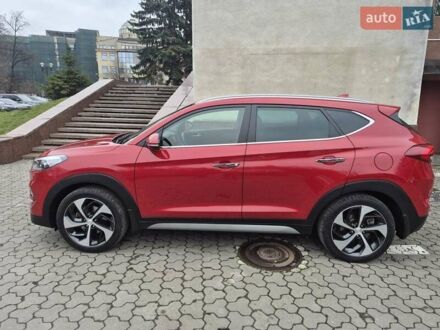 Красный Хендай Туксон, объемом двигателя 2 л и пробегом 39 тыс. км за 19550 $, фото 1 на Automoto.ua