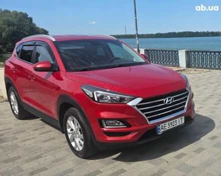 Красный Хендай Туксон, объемом двигателя 2 л и пробегом 90 тыс. км за 22000 $, фото 1 на Automoto.ua