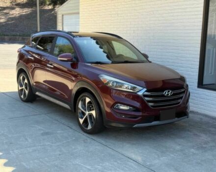 Красный Хендай Туксон, объемом двигателя 1.6 л и пробегом 44 тыс. км за 16000 $, фото 1 на Automoto.ua