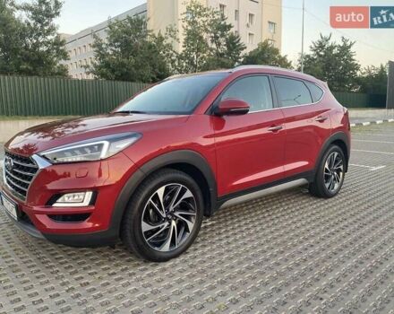 Красный Хендай Туксон, объемом двигателя 2 л и пробегом 39 тыс. км за 27300 $, фото 1 на Automoto.ua