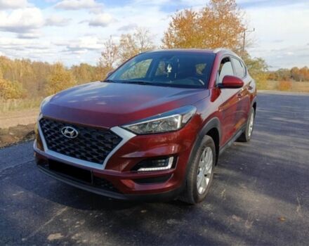 Червоний Хендай Туксон, об'ємом двигуна 2 л та пробігом 130 тис. км за 13000 $, фото 1 на Automoto.ua