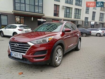 Красный Хендай Туксон, объемом двигателя 2 л и пробегом 116 тыс. км за 19200 $, фото 1 на Automoto.ua
