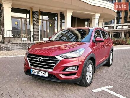 Красный Хендай Туксон, объемом двигателя 2 л и пробегом 94 тыс. км за 19500 $, фото 1 на Automoto.ua