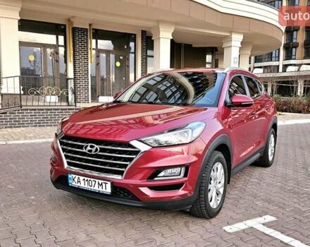 Красный Хендай Туксон, объемом двигателя 2 л и пробегом 94 тыс. км за 19500 $, фото 1 на Automoto.ua