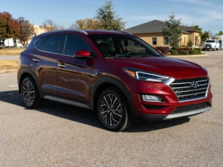 Красный Хендай Туксон, объемом двигателя 2 л и пробегом 45 тыс. км за 14000 $, фото 1 на Automoto.ua