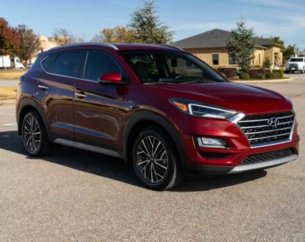 Красный Хендай Туксон, объемом двигателя 2 л и пробегом 45 тыс. км за 14000 $, фото 1 на Automoto.ua