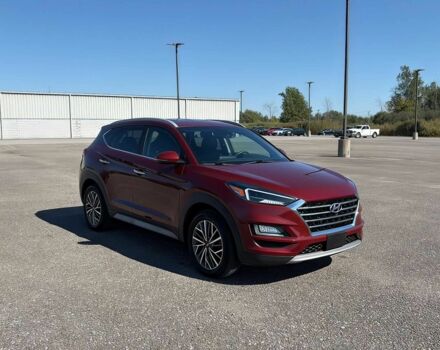 Красный Хендай Туксон, объемом двигателя 2.4 л и пробегом 38 тыс. км за 11300 $, фото 1 на Automoto.ua