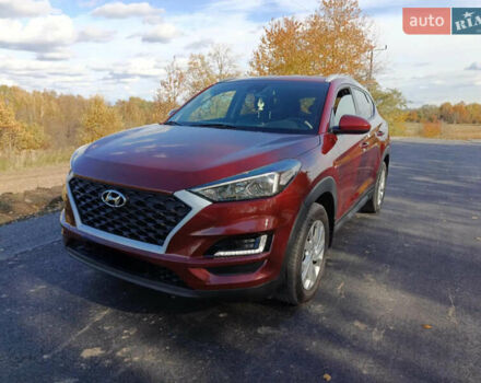 Красный Хендай Туксон, объемом двигателя 2 л и пробегом 97 тыс. км за 20000 $, фото 1 на Automoto.ua