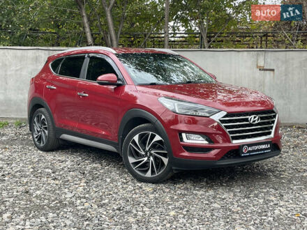 Красный Хендай Туксон, объемом двигателя 2 л и пробегом 67 тыс. км за 24490 $, фото 1 на Automoto.ua