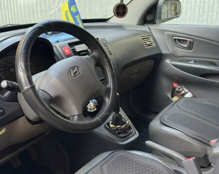 Хендай Туксон, объемом двигателя 2 л и пробегом 208 тыс. км за 6700 $, фото 10 на Automoto.ua