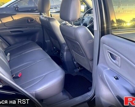 Хендай Туксон, объемом двигателя 2 л и пробегом 248 тыс. км за 7500 $, фото 6 на Automoto.ua