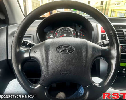 Хендай Туксон, объемом двигателя 2 л и пробегом 205 тыс. км за 5700 $, фото 11 на Automoto.ua