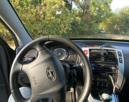 Хендай Туксон, объемом двигателя 1.98 л и пробегом 320 тыс. км за 7500 $, фото 16 на Automoto.ua