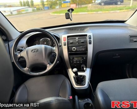 Хендай Туксон, объемом двигателя 2 л и пробегом 260 тыс. км за 7700 $, фото 10 на Automoto.ua