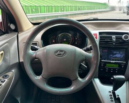 Хендай Туксон, объемом двигателя 2 л и пробегом 214 тыс. км за 7490 $, фото 14 на Automoto.ua