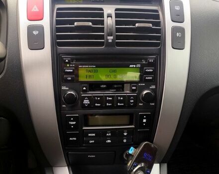 Хендай Туксон, объемом двигателя 2 л и пробегом 209 тыс. км за 8500 $, фото 6 на Automoto.ua