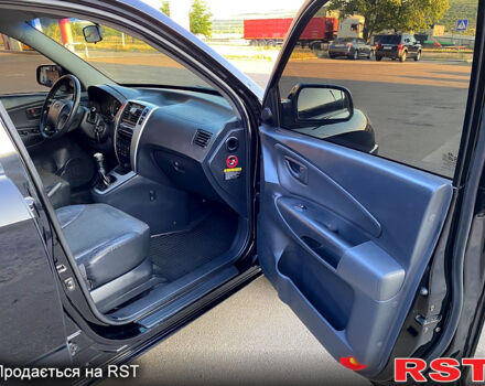 Хендай Туксон, объемом двигателя 2 л и пробегом 179 тыс. км за 7800 $, фото 11 на Automoto.ua