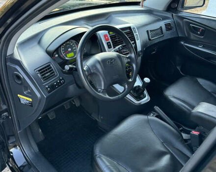 Хендай Туксон, объемом двигателя 2 л и пробегом 245 тыс. км за 7900 $, фото 28 на Automoto.ua