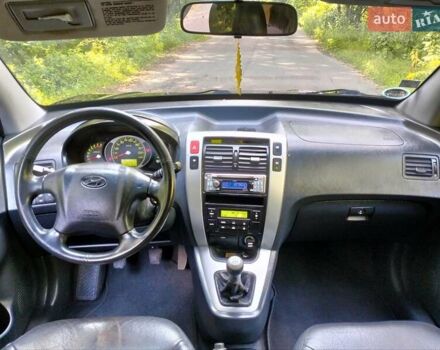 Хендай Туксон, об'ємом двигуна 1.98 л та пробігом 165 тис. км за 9900 $, фото 27 на Automoto.ua