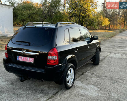 Хендай Туксон, объемом двигателя 2 л и пробегом 245 тыс. км за 7900 $, фото 9 на Automoto.ua