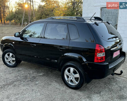 Хендай Туксон, объемом двигателя 2 л и пробегом 245 тыс. км за 7900 $, фото 7 на Automoto.ua