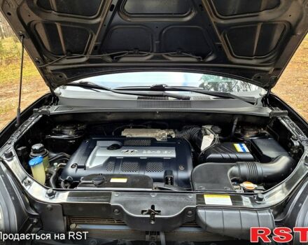 Хендай Туксон, объемом двигателя 2 л и пробегом 198 тыс. км за 7800 $, фото 8 на Automoto.ua