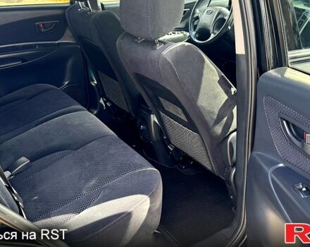 Хендай Туксон, объемом двигателя 2 л и пробегом 210 тыс. км за 8000 $, фото 6 на Automoto.ua