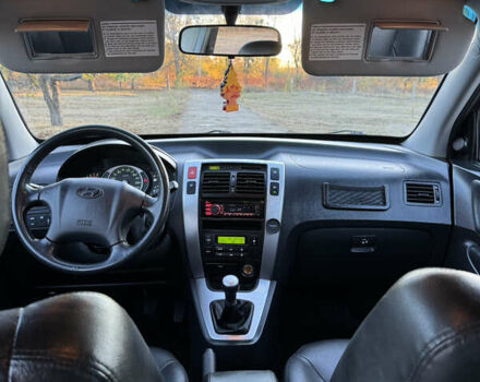 Хендай Туксон, объемом двигателя 2 л и пробегом 245 тыс. км за 7900 $, фото 45 на Automoto.ua