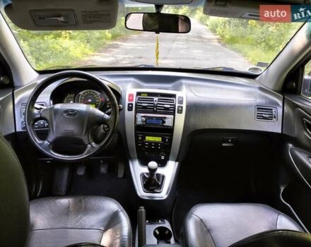 Хендай Туксон, об'ємом двигуна 1.98 л та пробігом 165 тис. км за 9900 $, фото 24 на Automoto.ua