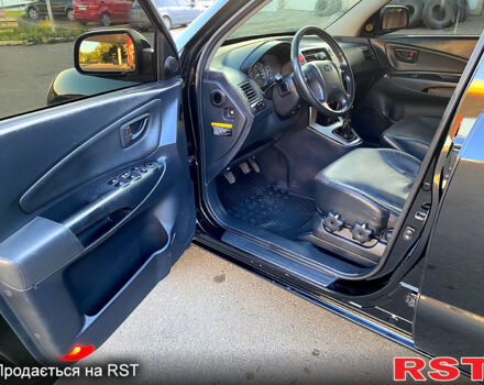 Хендай Туксон, объемом двигателя 2 л и пробегом 179 тыс. км за 7800 $, фото 10 на Automoto.ua