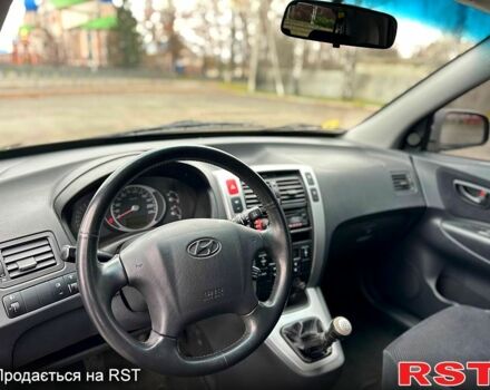 Хендай Туксон, об'ємом двигуна 2 л та пробігом 203 тис. км за 8100 $, фото 8 на Automoto.ua