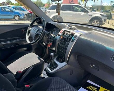 Хендай Туксон, объемом двигателя 2 л и пробегом 219 тыс. км за 8200 $, фото 11 на Automoto.ua