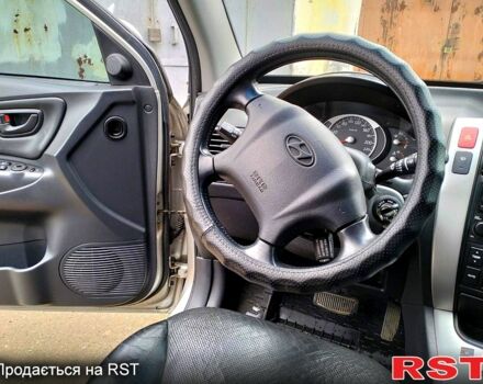 Хендай Туксон, объемом двигателя 2 л и пробегом 247 тыс. км за 8200 $, фото 6 на Automoto.ua