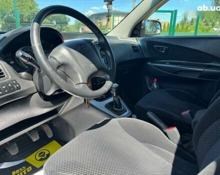 Хендай Туксон, объемом двигателя 2 л и пробегом 219 тыс. км за 8200 $, фото 14 на Automoto.ua