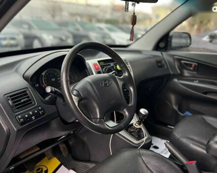 Хендай Туксон, объемом двигателя 2 л и пробегом 244 тыс. км за 9200 $, фото 8 на Automoto.ua
